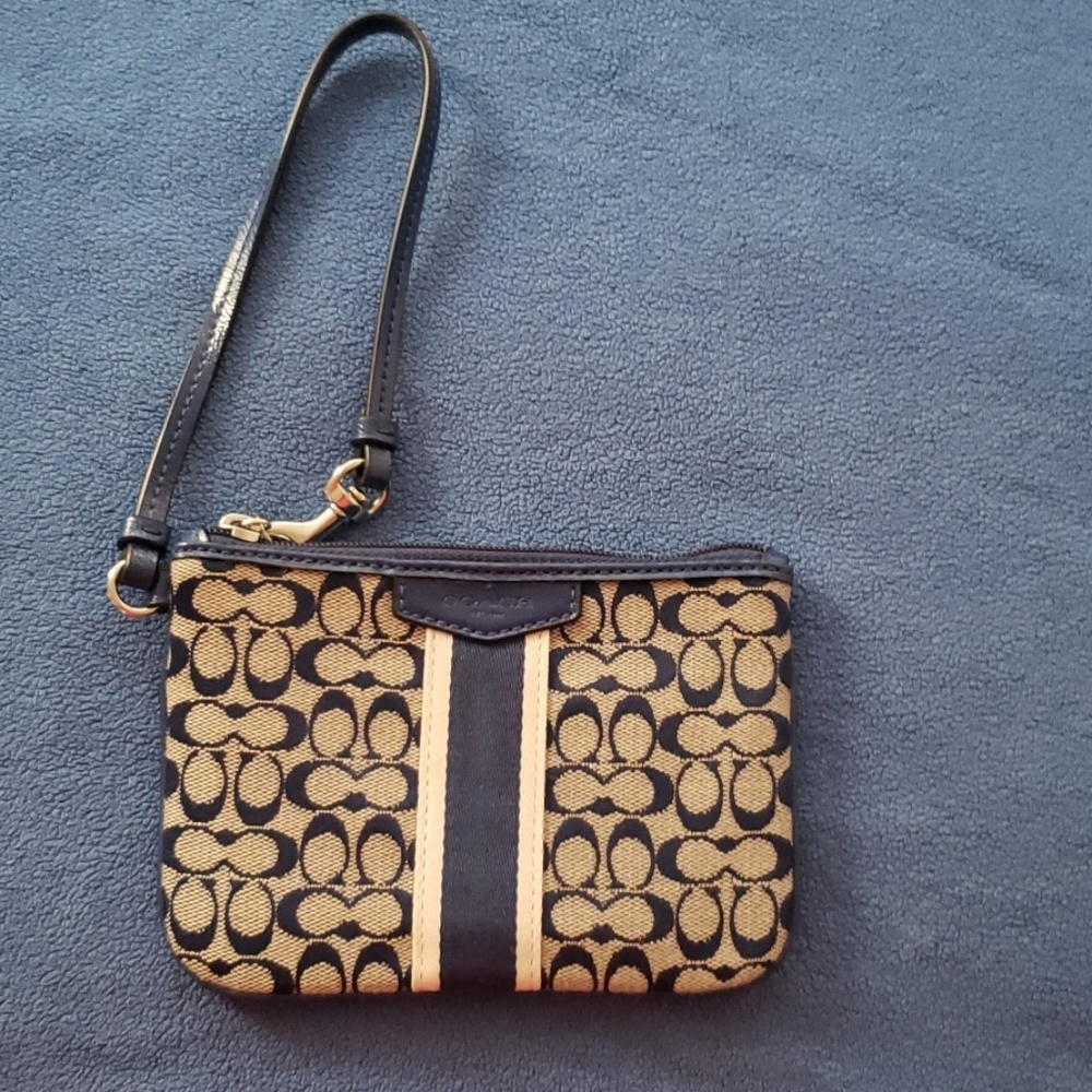Blue classic Coach Wristlet 5 in x 4 in